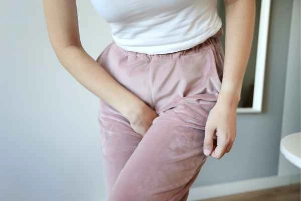 older woman running to the toilet because of urinary incontinence Nantwich