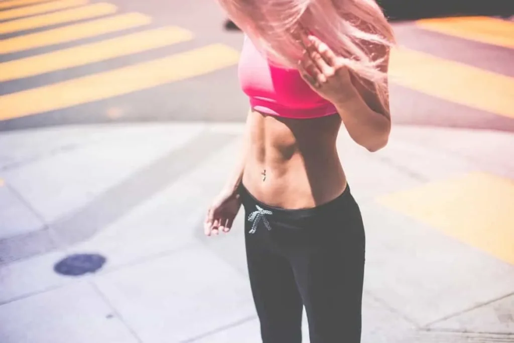 Woman with toned stomach after LA-EMS Body Sculpting Treatment Nantwich 